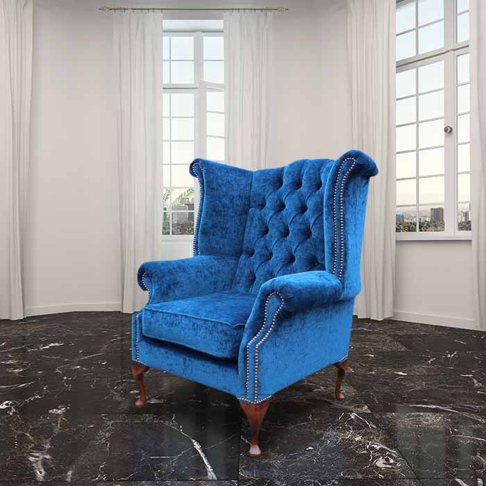 Product photograph of Chesterfield High Back Wing Chair Velluto Royal Blue Fabric In Queen Anne Style from Chesterfield Sofas