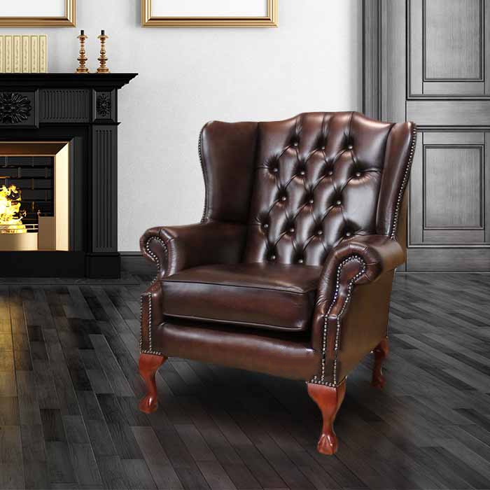 Product photograph of Chesterfield Highclere Wing Chair Antique Brown Leather In Mallory Style from Chesterfield Sofas