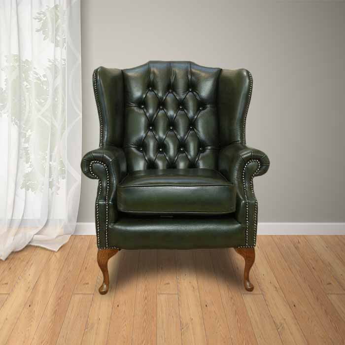 Product photograph of Chesterfield Highclere Wing Chair Antique Green Leather In Mallory Style from Chesterfield Sofas