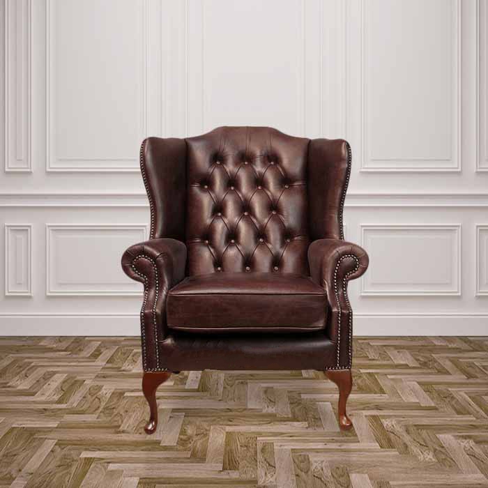 Product photograph of Chesterfield Highclere Wing Chair Old English Dark Brown Leather In Mallory Style from Chesterfield Sofas
