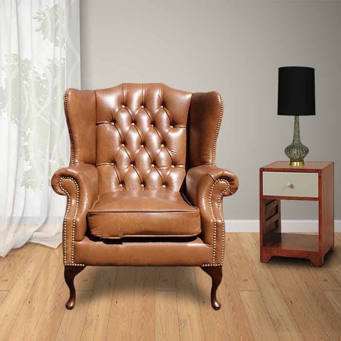 Product photograph of Chesterfield Highclere Wing Chair Old English Tan Leather In Mallory Style from Chesterfield Sofas