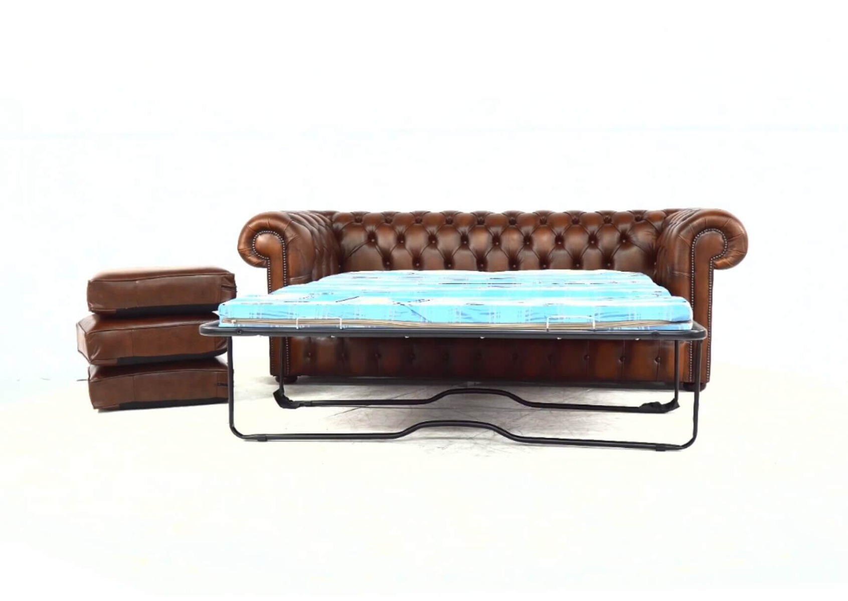 Product photograph of Chesterfield 3 Seater Sofabed Antique Tan Real Leather In Classic Style from Chesterfield Sofas.