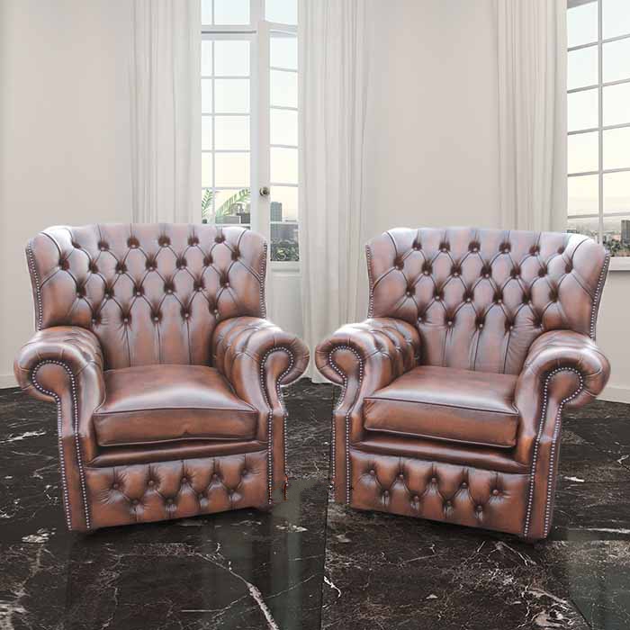 Product photograph of Chesterfield Pair High Back Wing Chair Antique Brown Leather Armchair In Monks Style from Chesterfield Sofas