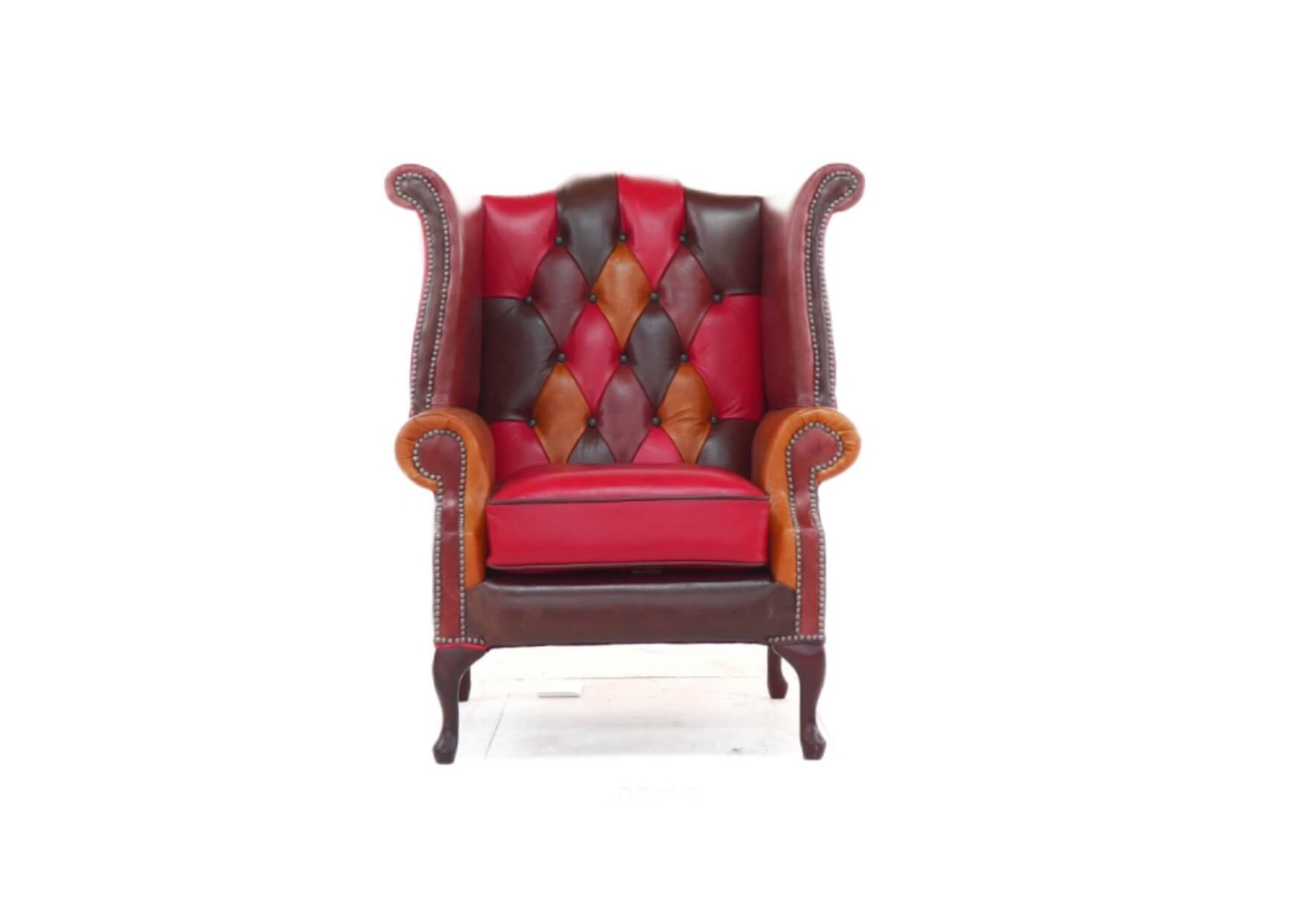 Product photograph of Chesterfield Patchwork High Back Wing Chair Old English Real Leather In Queen Anne Style from Chesterfield Sofas.