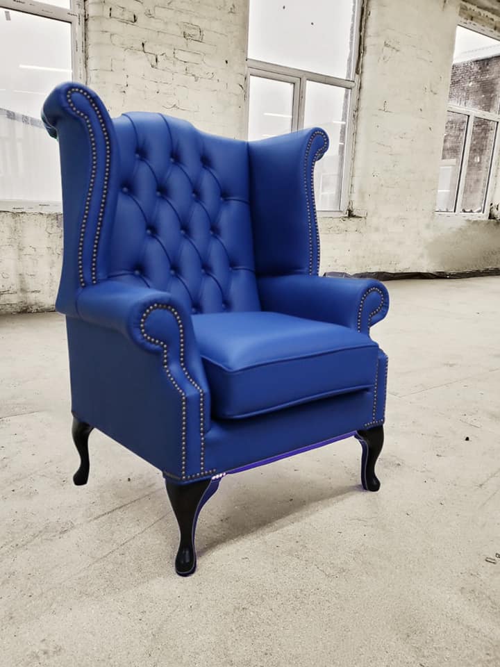 Product photograph of Chesterfield High Back Wing Chair Shelly Deep Ultramarine Blue Real Leather Bespoke In Queen Anne Style from Chesterfield Sofas.