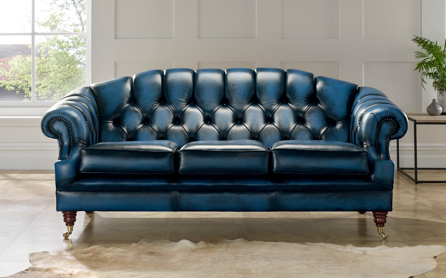 Product photograph of Chesterfield 3 Seater Antique Blue Leather Sofa Settee In Victoria Style from Chesterfield Sofas