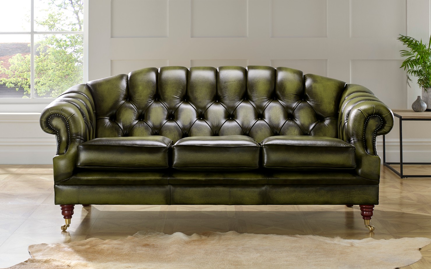 Product photograph of Chesterfield 3 Seater Antique Olive Leather Sofa Settee In Victoria Style from Chesterfield Sofas