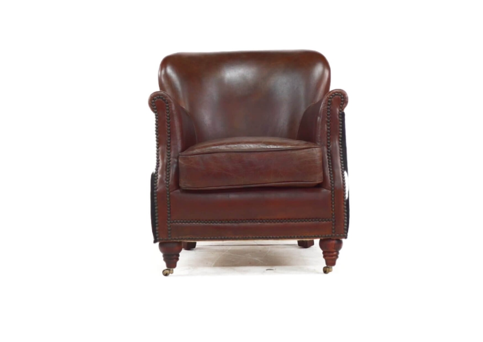 Product photograph of Vintage Hair On Hide Black Cow Armchair Distressed Brown Real Leather from Chesterfield Sofas