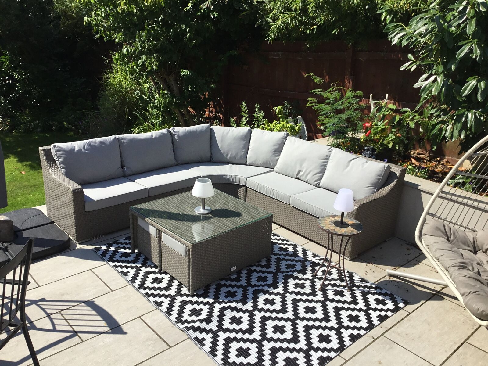 Product photograph of Kian Large Corner Grey Rattan Garden Sofa Set With Square Coffee Table 4 Stools In Grey from Chesterfield Sofas