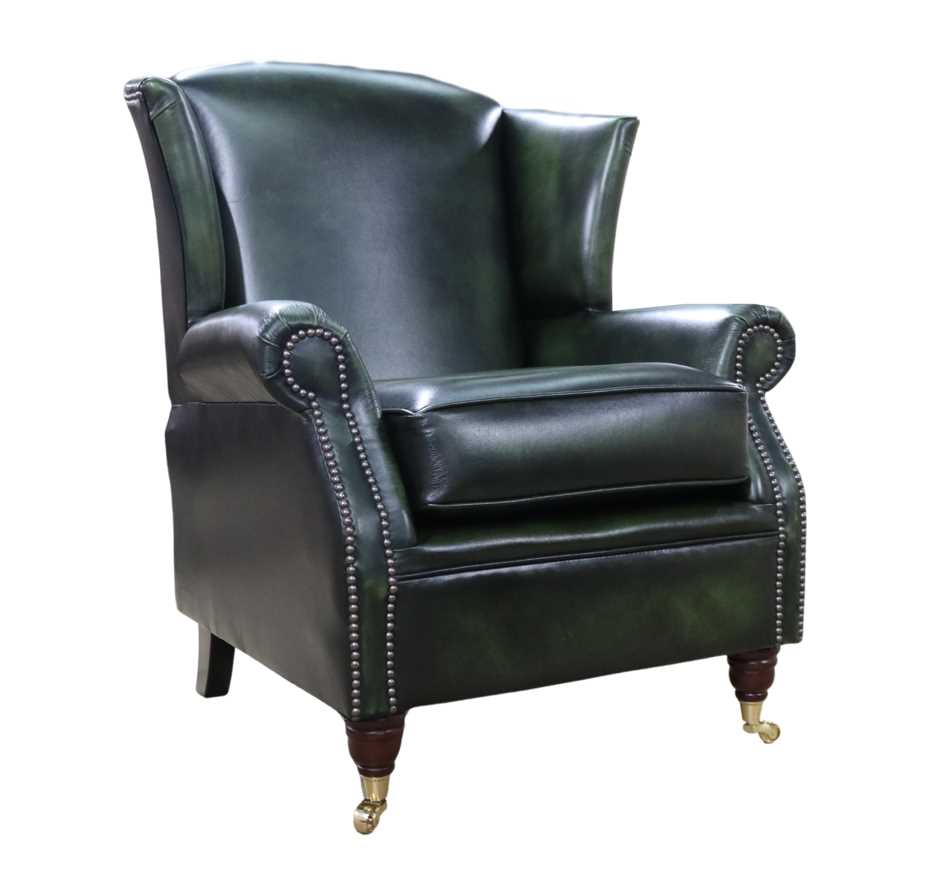 Product photograph of Southwold Chesterfield Wing Chair Fireside High Back Armchair Antique Green Leather In Stock from Chesterfield Sofas.