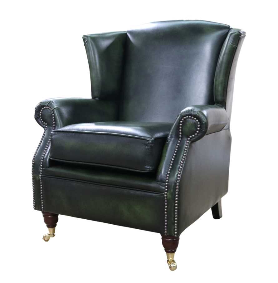 Product photograph of Southwold Chesterfield Wing Chair Fireside High Back Armchair Antique Green Leather In Stock from Chesterfield Sofas.
