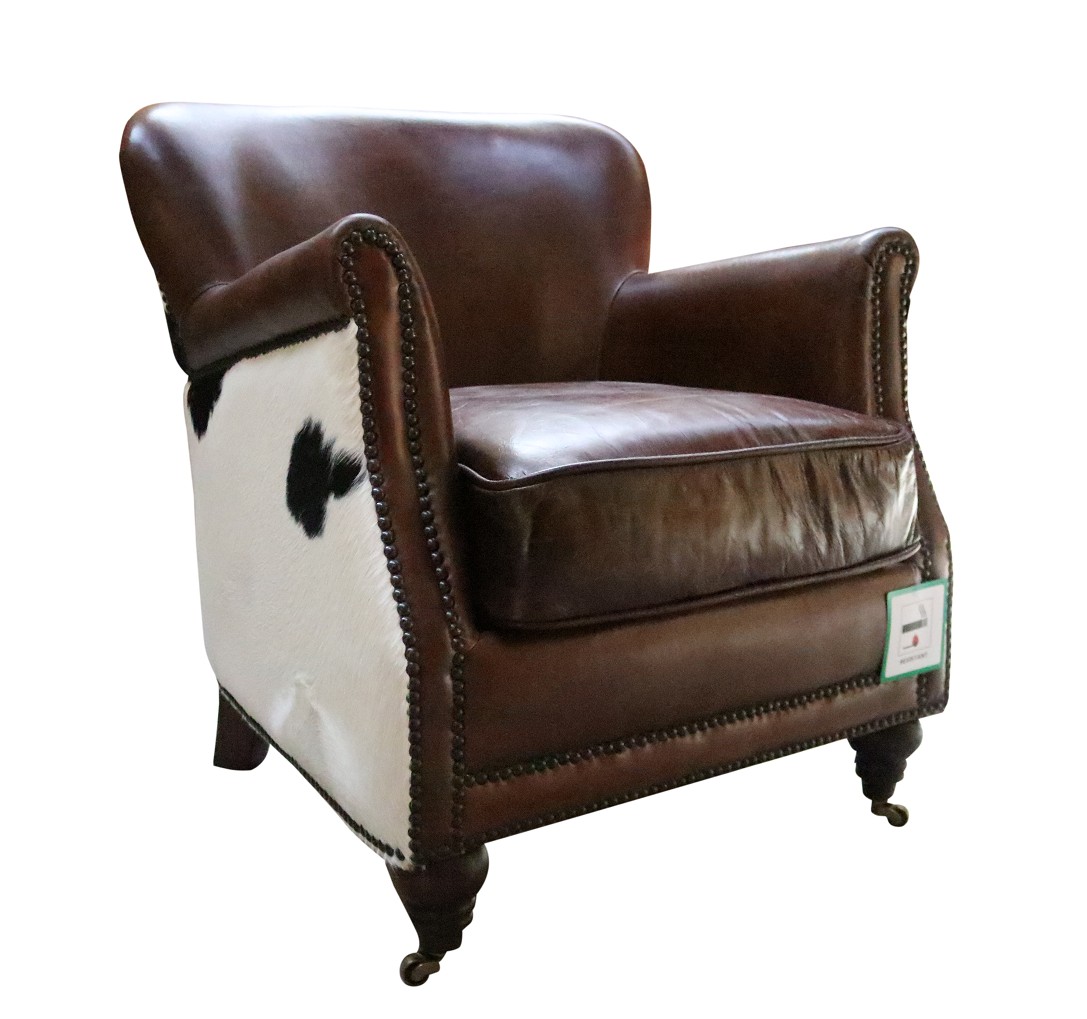 Product photograph of Vintage Black Cow Armchair Distressed Brown Real Leather from Chesterfield Sofas