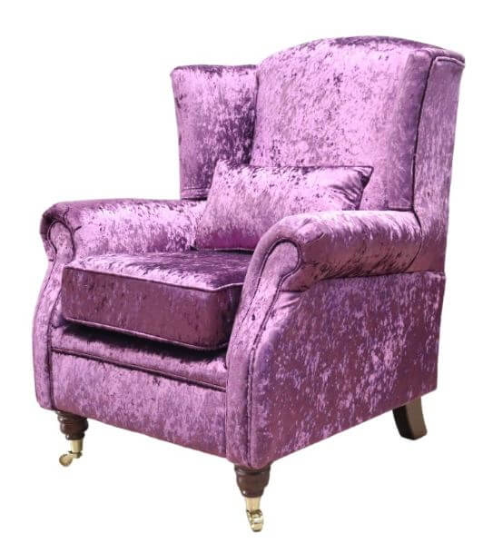 Product photograph of Wing Chair Fireside High Back Armchair Shimmer Amethyst Purple Velvet In Stock from Chesterfield Sofas.